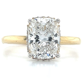 Yellow gold engagement ring with elongated cushion cut lab diamond