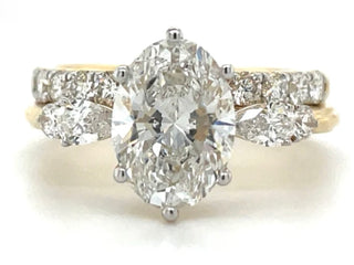 ALEXA - 14CT YELLOW GOLD
2.81CT LABORATORY GROWN SIX
CLAW OVAL DIAMOND
ENGAGEMENT RING WITH SIDE STONES & 0.59CT CASTEL SET
BAND