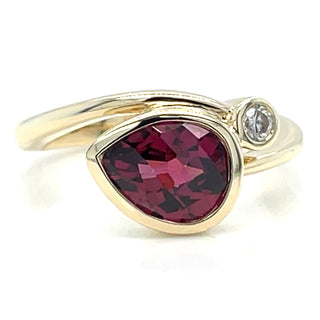 unique gold gemstone ring with garnet and diamond stones