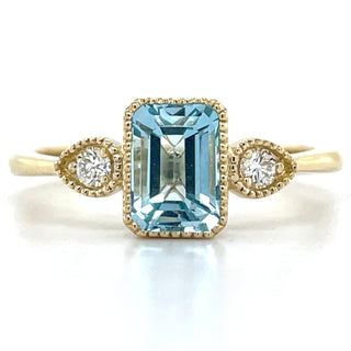 9ct Yellow Gold Milgrain Edge Earth Grown 1.26ct Blue Topaz & 0.10ct Diamond Ring