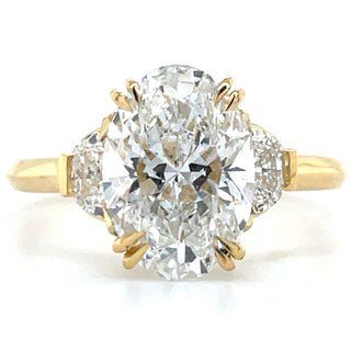 JULIETTE - 18CT YELLOW GOLD
2.94CT OVAL LABORATORY
GROWN DIAMOND
ENGAGEMENT RING WITH HALF MOON CUT DIAMOND SIDE
STONES