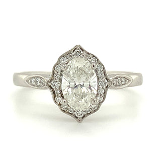 platinum oval diamond engagement ring with diamond halo
