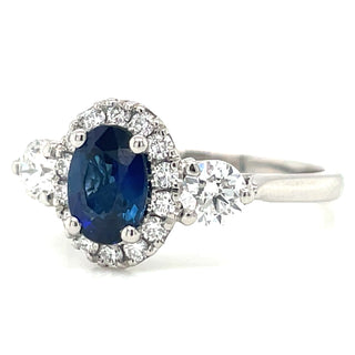 Platinum Oval Sapphire, Diamond Halo & Round Side Diamond  Ring