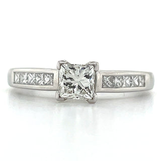 18ct white gold princess cut diamond engagement ring with channel set diamond shoulders