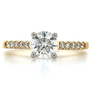 18ct yellow gold round diamond engagement ring with stone set shoulders