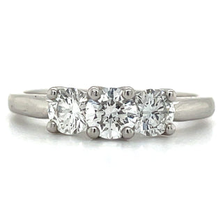 platinum round three stone diamond engagement ring