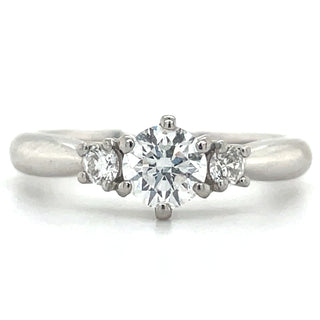 platinum three stone round diamond engagement ring