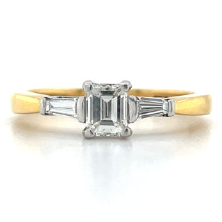 yellow gold emerald cut and tapered baguette cut diamond engagement ring