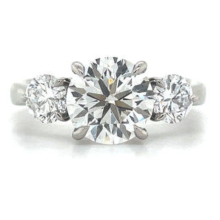 platinum three stone diamond engagement ring