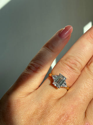 Saige - 18ct Yellow Gold 2.47ct Laboratory Grown Emerald Cut Diamond & Trillion Side Stone Engagement Ring