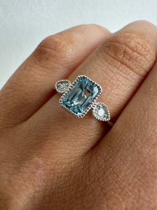 9ct White Gold Milgrain Edge Earth Grown 1.21ct Blue Topaz & 0.10ct Diamond Ring