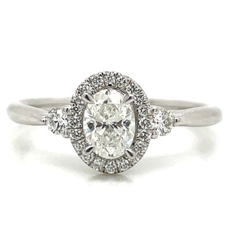 Remi - Platinum Natural 0.71ct Oval Halo Diamond Ring With Two Side Diamonds