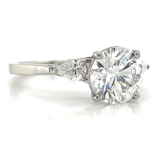 Emerie - Platinum 1.98ct Round Brilliant Laboratory Grown Diamond & Pear Side Stone Engagement Ring