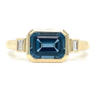 9ct Yellow Gold Earth Grown Horizontal Emerald Cut Blue Topaz And Diamond Ring