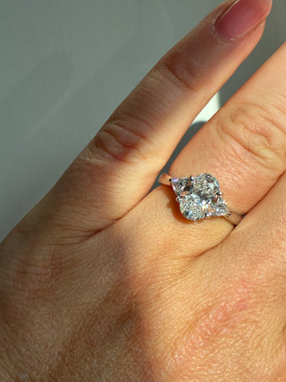 Flossie - Platinum Laboratory Grown 1.34ct Oval Diamond With Trillion Side Stone Engagement Ring