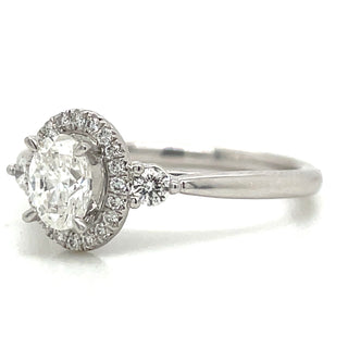 Remi- Platinum Natural 0.71ct Oval Halo Diamond Ring With Two Side Diamonds