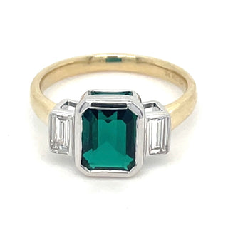 9ct Yellow Gold Laboratory Grown 1.77ct Emerald Cut Emerald And 0.21ct Side Baguette Diamond Ring