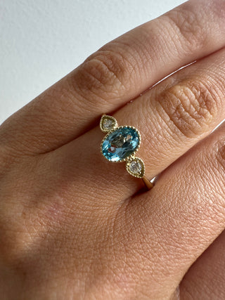 9ct Yellow Gold Milgrain Edge Earth Grown 0.80ct Blue Topaz & 0.10ct Diamond Ring