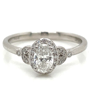 Avril - Platinum Natural 0.52ct Oval Halo Diamond Ring With Vintage Side Detail