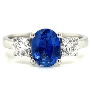 Platinum Earth Grown Oval Ceylon Sapphire With Side Diamonds Three Stone Ring