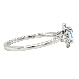 9ct White Gold Earth Grown Oval Sky Blue Topaz & Diamond Halo Ring