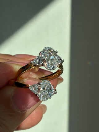 Flossie - Platinum Laboratory Grown 1.34ct Oval Diamond With Trillion Side Stone Engagement Ring