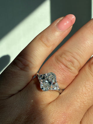 Flossie - Platinum Laboratory Grown 1.88ct Oval Diamond With Trillion Side Stone Engagement Ring