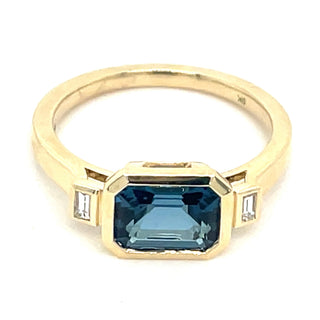 9ct Yellow Gold Earth Grown Horizontal Emerald Cut Blue Topaz And Diamond Ring