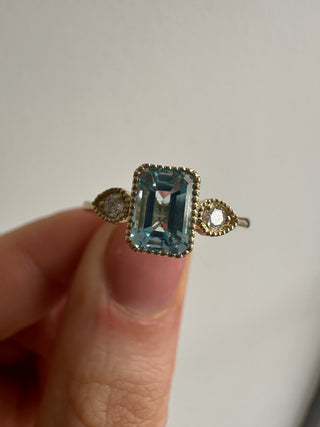 9ct Yellow Gold Milgrain Edge Earth Grown 1.26ct Blue Topaz & 0.10ct Diamond Ring