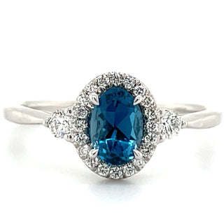 9ct White Gold Earth Grown 0.57ct London Blue topaz and 0.21ct Diamond Halo Ring