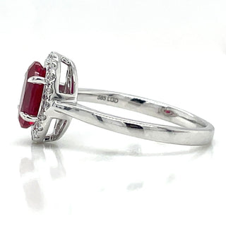 14ct White Gold Laboratory Grown 1.40ct Ruby And 0.15ct Diamond Halo Ring