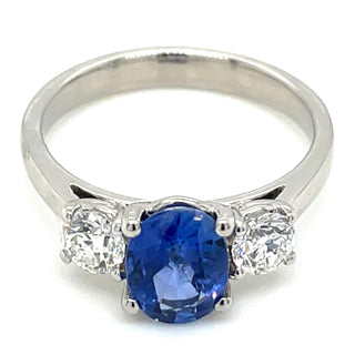 Platinum Earth Grown Oval Ceylon Sapphire With Side Diamonds Three Stone Ring