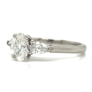 Ciara - Platinum Oval Centre With Pear Side Stone Diamond Ring