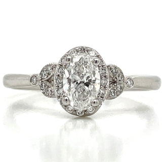 Avril - Platinum Natural 0.52ct Oval Halo Diamond Engagement Ring With Vintage Side Detail