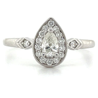 white gold pear halo diamond engagement ring with side stones