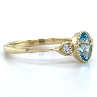 9ct Yellow Gold Milgrain Edge Earth Grown 0.80ct Blue Topaz & 0.10ct Diamond Ring