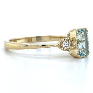 9ct Yellow Gold Milgrain Edge Earth Grown 1.26ct Blue Topaz & 0.10ct Diamond Ring