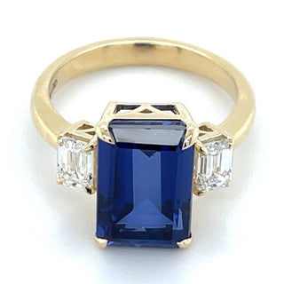 14ct Yellow Gold Laboratory Grown Emerald cut 7.35ct Sapphire with Two Laboratory grown Diamond Side Stone Ring