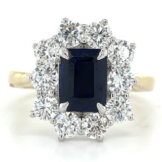 9ct Yellow Gold Laboratory Grown 2.44ct Emerald Cut Sapphire & 1.56ct Diamond Halo Ring