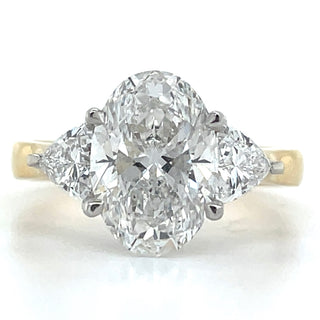 Lula - 18ct Yellow Gold Laboratory Grown 3.13ct Oval Diamond With Trillion Side Stone Engagement Ring
