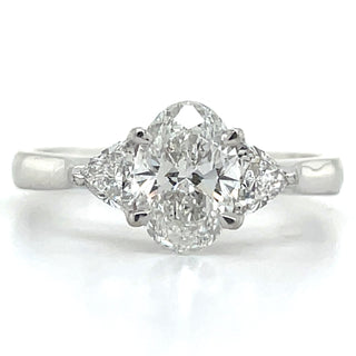 Flossie - Platinum Laboratory Grown 1.34ct Oval Diamond With Trillion Side Stone Engagement Ring