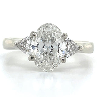 Flossie - Platinum Laboratory Grown 1.88ct Oval Diamond With Trillion Side Stone Engagement Ring