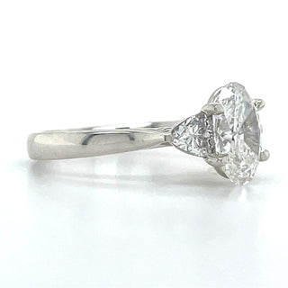 Flossie - Platinum Laboratory Grown 1.88ct Oval Diamond With Trillion Side Stone Engagement Ring