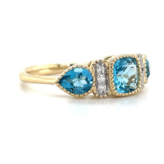 9ct Yellow Gold Earth Grown 1.59ct Blue Topaz & 0.06ct Diamond Ring