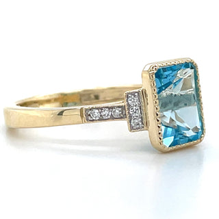 9ct Yellow Gold Earth Grown 2.47ct Blue Topaz & 0.07ct Diamond Ring