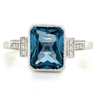 9ct White Gold Earth Grown 2.47ct London Blue Topaz & 0.07ct Diamond Ring