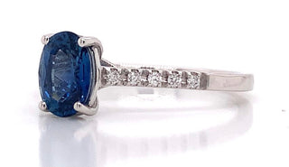 18ct White Gold Earth Grown 1.10ct Oval Sapphire With 0.09ct Diamond Set Shoulders Ring