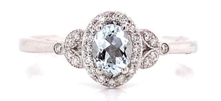 9ct White Gold 0.25ct Oval Aquamarine Castle Halo With Vintage 0.12ct Diamond Side Detail Ring