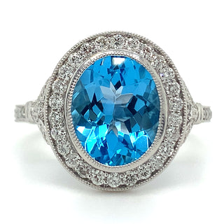 9ct White Gold 3.35ct Earth Grown Oval Cut Blue Topaz & Diamond Halo Ring