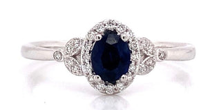 9ct White Gold 0.40ct Oval Sapphire Castle Halo With Vintage 0.12ct Diamond Side Detail Ring